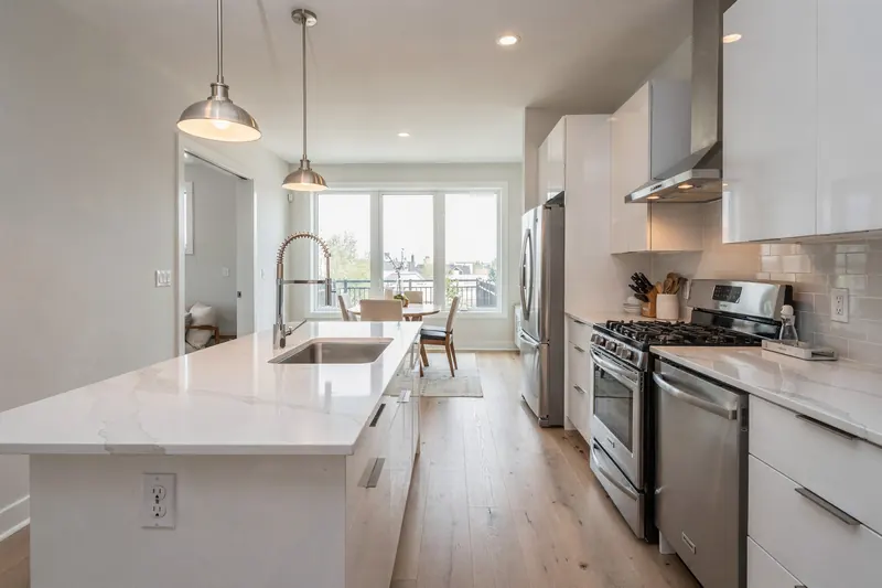 Bright modern kitchen with white cabinetry